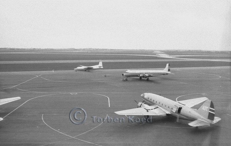 Fred. Olsen Curtis C-46R and Douglas DC-6A at Kastrup Airport with an Icelandair Fokker F-27